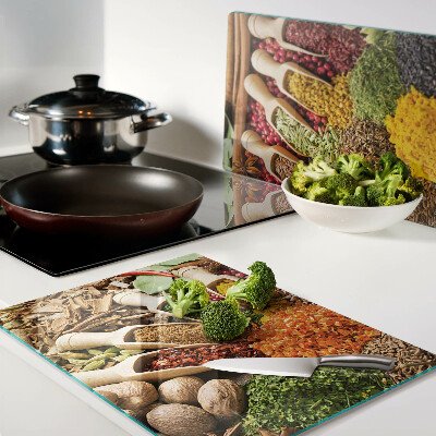 Tagliere in vetro con motivo di spezie ed erbe