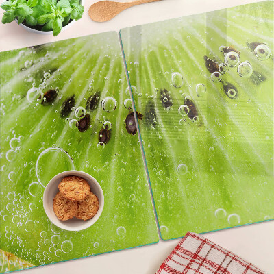 Tagliere in vetro con stampa di kiwi con gocce d'acqua