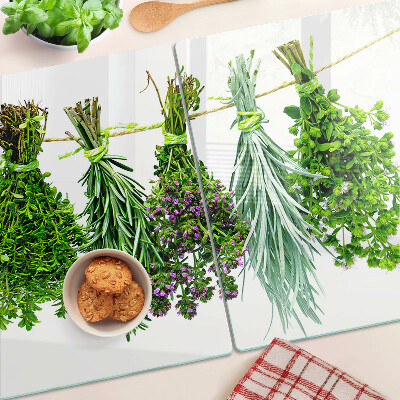 Tagliere in vetro temperato con stampa di erbe essiccate legate con spago