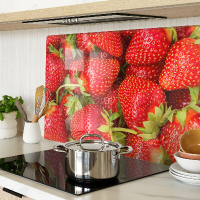 Tagliere in vetro temperato con motivo di fragole sullo sfondo