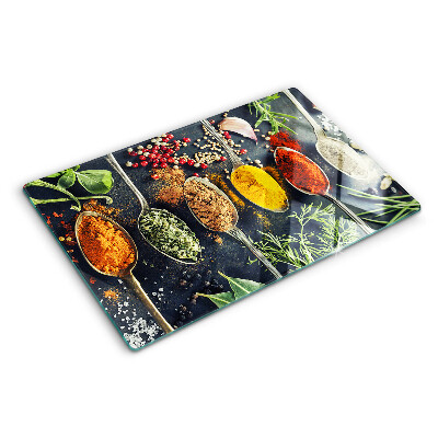 Tagliere in vetro con motivo di spezie nei cucchiai