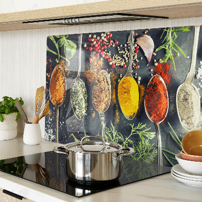 Tagliere in vetro con motivo di spezie nei cucchiai