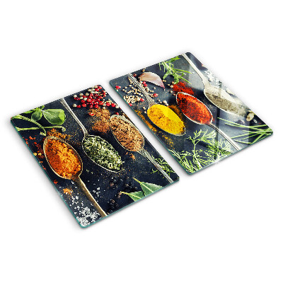 Tagliere in vetro con motivo di spezie nei cucchiai