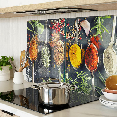 Tagliere in vetro con motivo di spezie nei cucchiai