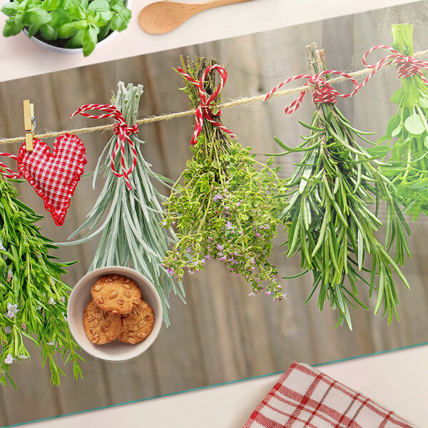 Tagliere in vetro temperato con motivo di erbe legate con spago