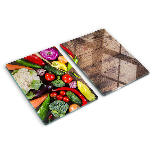 Tagliere in vetro temperato con stampa di verdure su sfondo di legno