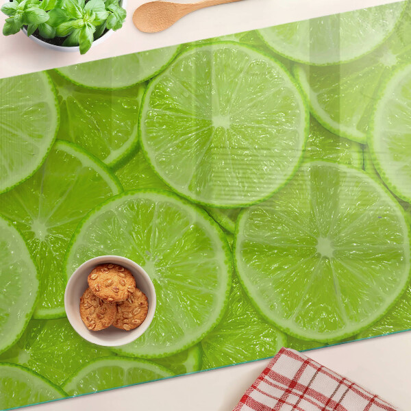 Tagliere in vetro temperato con stampa di fette di lime su sfondo verde