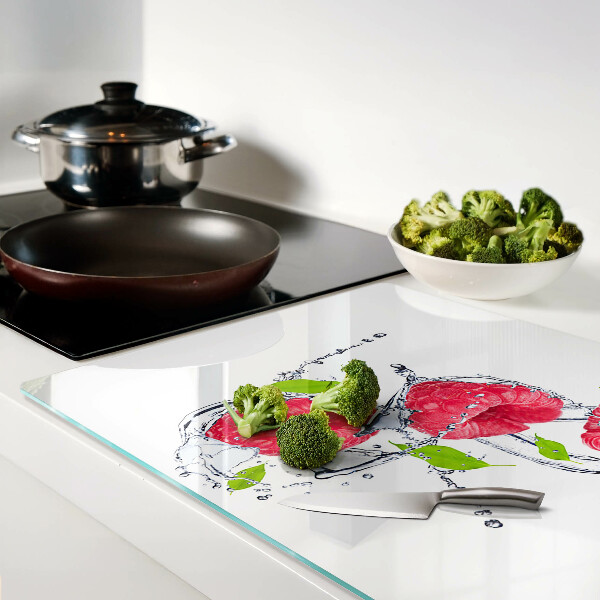 Tagliere in vetro temperato con stampa di lamponi in acqua e foglie