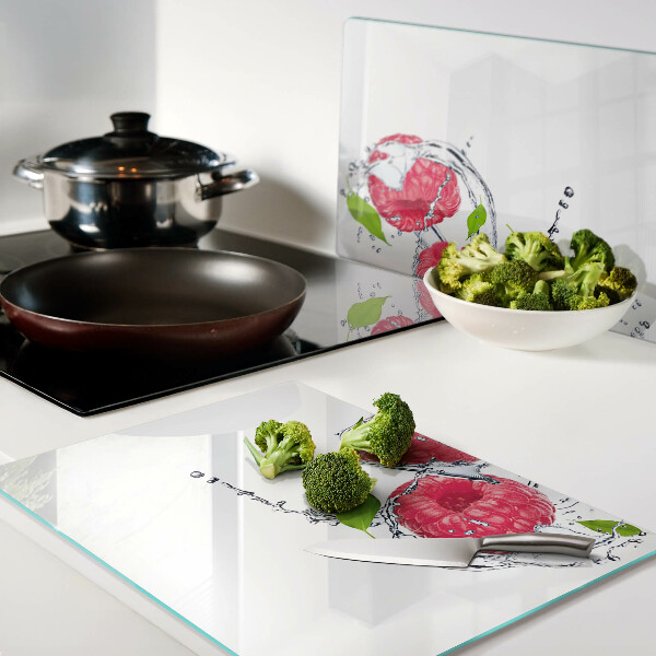 Tagliere in vetro temperato con stampa di lamponi in acqua e foglie