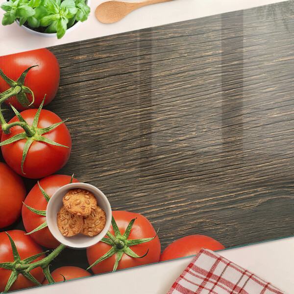 Tagliere in vetro Pomodori su sfondo di legno