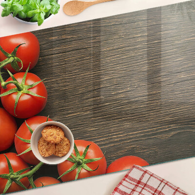 Tagliere in vetro Pomodori su sfondo di legno