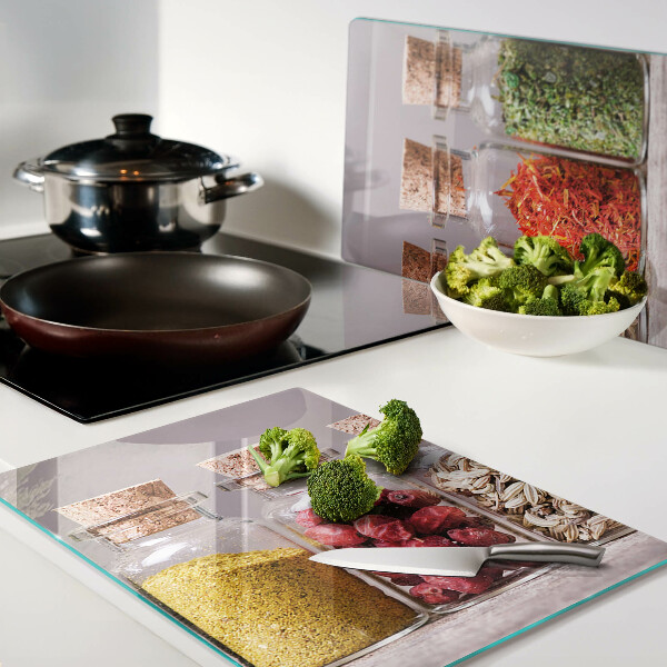 Tagliere in vetro temperato con motivo spezie in barattoli su stampa