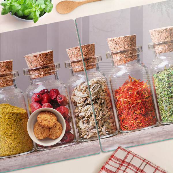 Tagliere in vetro temperato con motivo spezie in barattoli su stampa