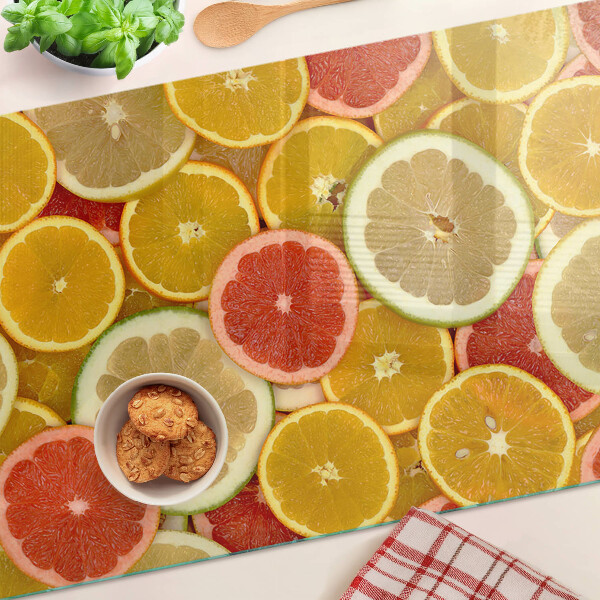 Tagliere in vetro temperato con motivo di agrumi nei colori dell'arcobaleno