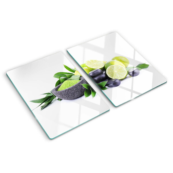 Tagliere in vetro Limoni e uva su sfondo verde