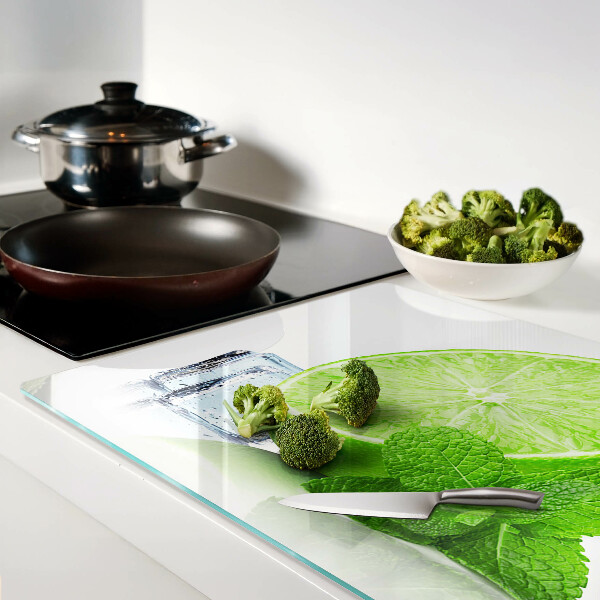 Tagliere in vetro temperato con decorazione a lime, menta e ghiaccio