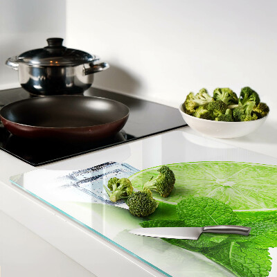 Tagliere in vetro temperato con decorazione a lime, menta e ghiaccio