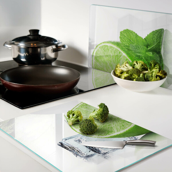 Tagliere in vetro temperato con decorazione a lime, menta e ghiaccio