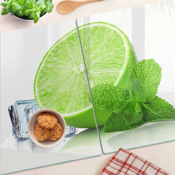 Tagliere in vetro temperato con decorazione a lime, menta e ghiaccio