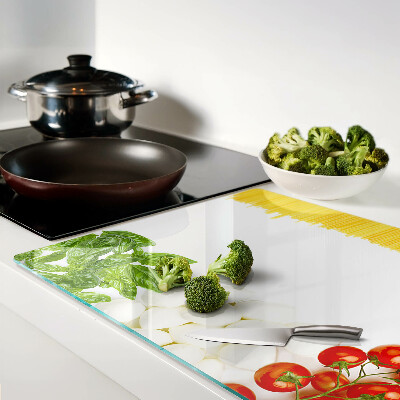 Tagliere in vetro temperato con motivo pasta con erbe e pomodori