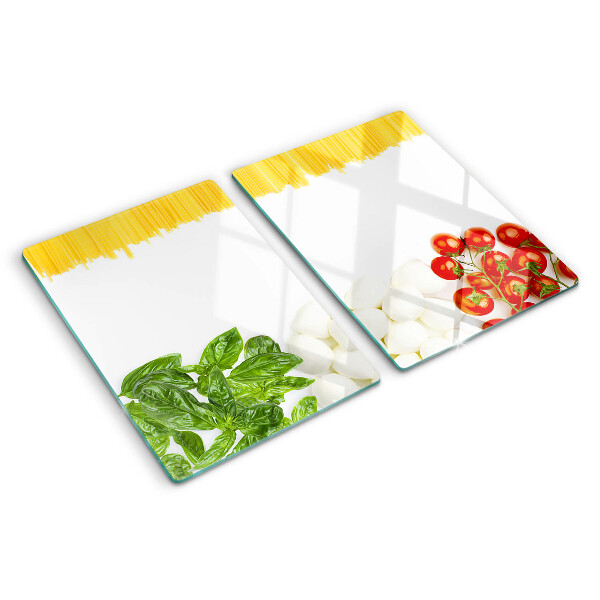 Tagliere in vetro temperato con motivo pasta con erbe e pomodori