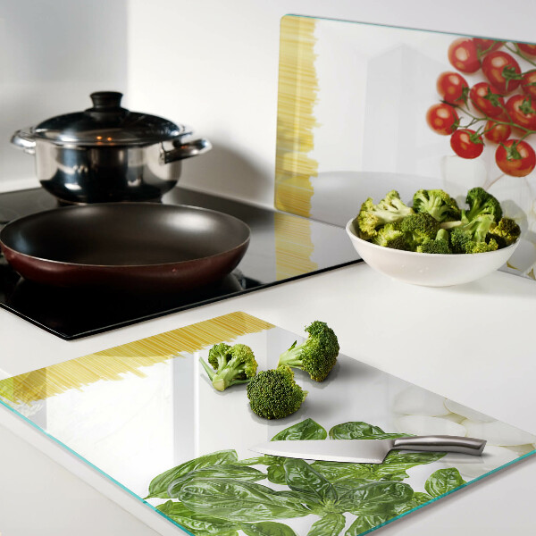 Tagliere in vetro temperato con motivo pasta con erbe e pomodori