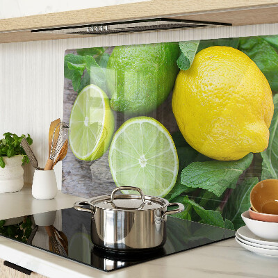 Tagliere in vetro temperato con decorazione di limoni e lime e foglie di menta