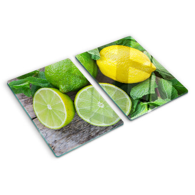 Tagliere in vetro temperato con decorazione di limoni e lime e foglie di menta