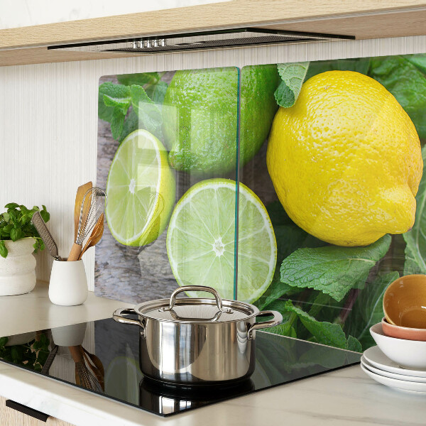 Tagliere in vetro temperato con decorazione di limoni e lime e foglie di menta