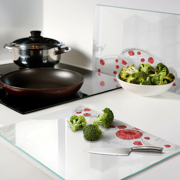 Tagliere in vetro temperato con stampa raffigurante bollicine di lampone in acqua