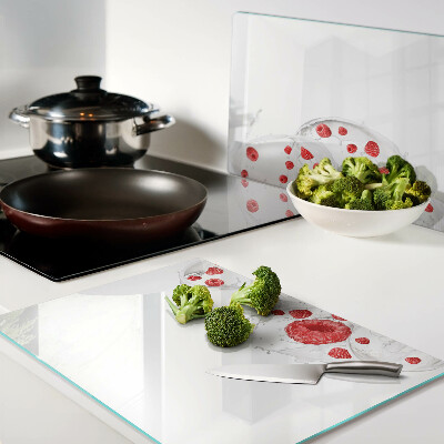 Tagliere in vetro temperato con stampa raffigurante bollicine di lampone in acqua