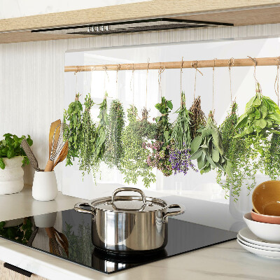 Tagliere in vetro temperato con stampa di erbe essiccate su sfondo a spago