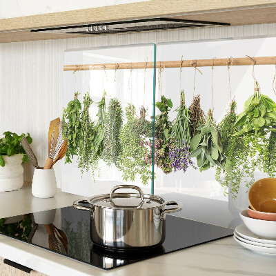 Tagliere in vetro temperato con stampa di erbe essiccate su sfondo a spago