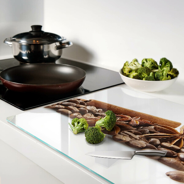 Tagliere in vetro con decorazione a spezie e chicchi di caffè