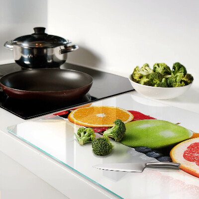 Tagliere in vetro con motivo di frutti agrumati nei toni pastello