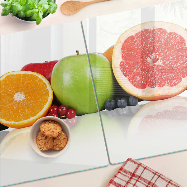 Tagliere in vetro con motivo di frutti agrumati nei toni pastello