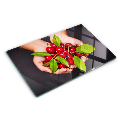 Tagliere in vetro temperato con stampa di ciliegie rosse che si incontrano nelle mani