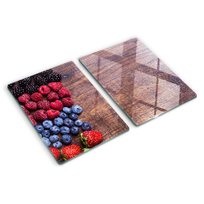 Tagliere in vetro temperato con stampa di frutti di bosco su sfondo di legno