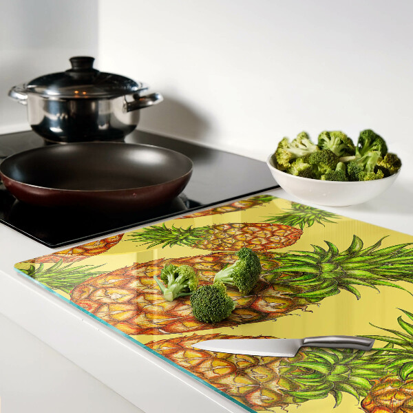 Tagliere in vetro temperato con motivo ananas su sfondo giallo