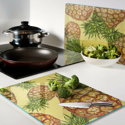 Tagliere in vetro temperato con motivo ananas su sfondo giallo