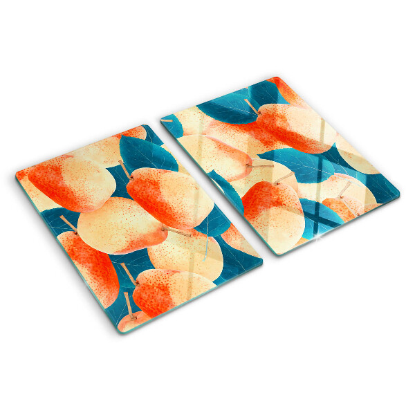 Tagliere in vetro temperato con decoro di pesche su sfondo di foglie