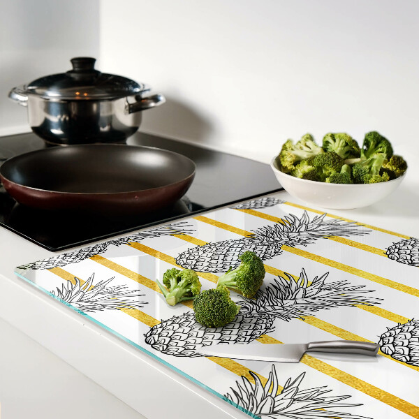 Tagliere in vetro con motivo ananas su sfondo a righe