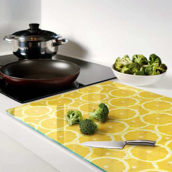 Tagliere in vetro temperato con stampa di fette di limone su sfondo giallo