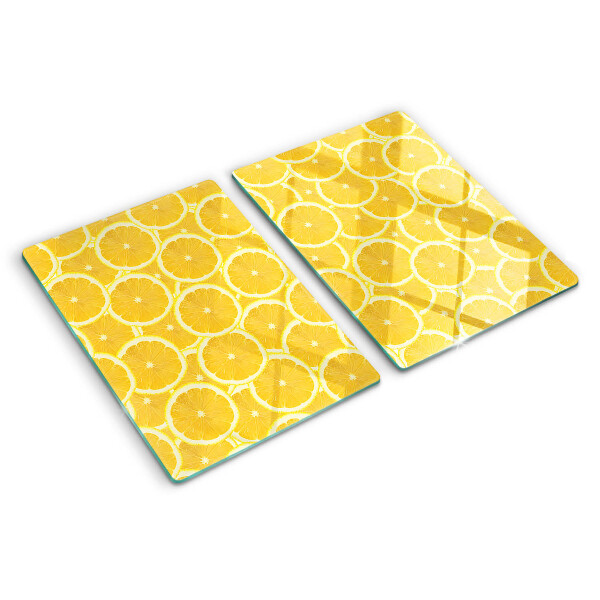 Tagliere in vetro temperato Fette di limone su sfondo giallo