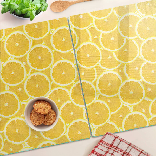Tagliere in vetro temperato con stampa di fette di limone su sfondo giallo