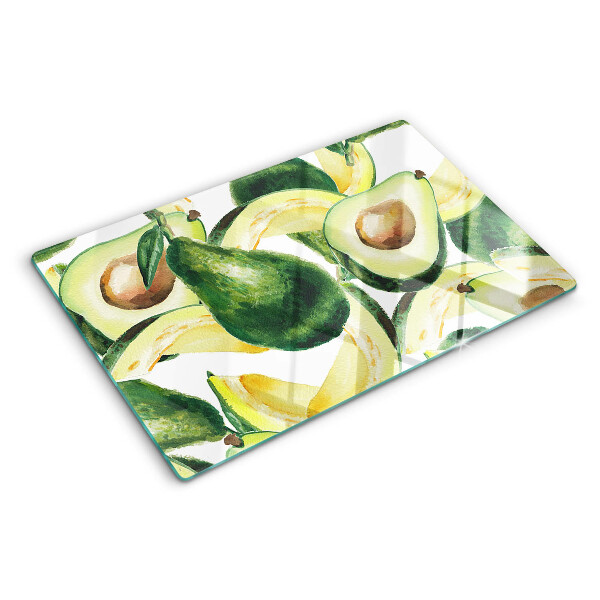 Tagliere in vetro temperato Avocado sullo sfondo di foglie
