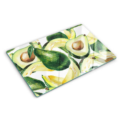 Tagliere in vetro temperato Avocado sullo sfondo di foglie