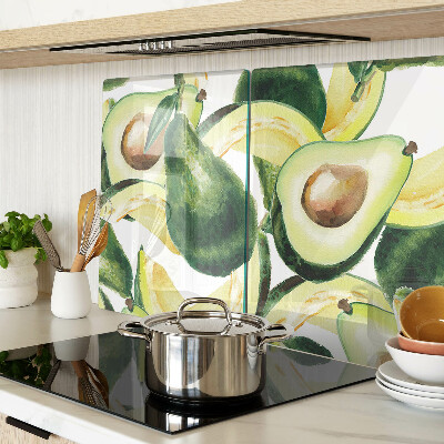Tagliere in vetro temperato Avocado sullo sfondo di foglie