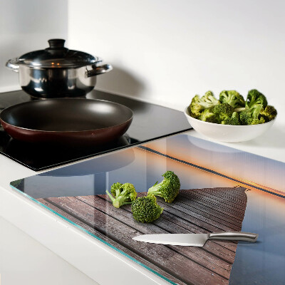 Tagliere in vetro temperato con stampa raffigurante un pontile sul lago al tramonto