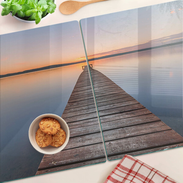 Tagliere in vetro temperato con stampa raffigurante un pontile sul lago al tramonto